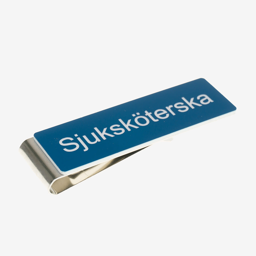 Tunnistemerkki sotilasklipsillä sairaanhoitaja